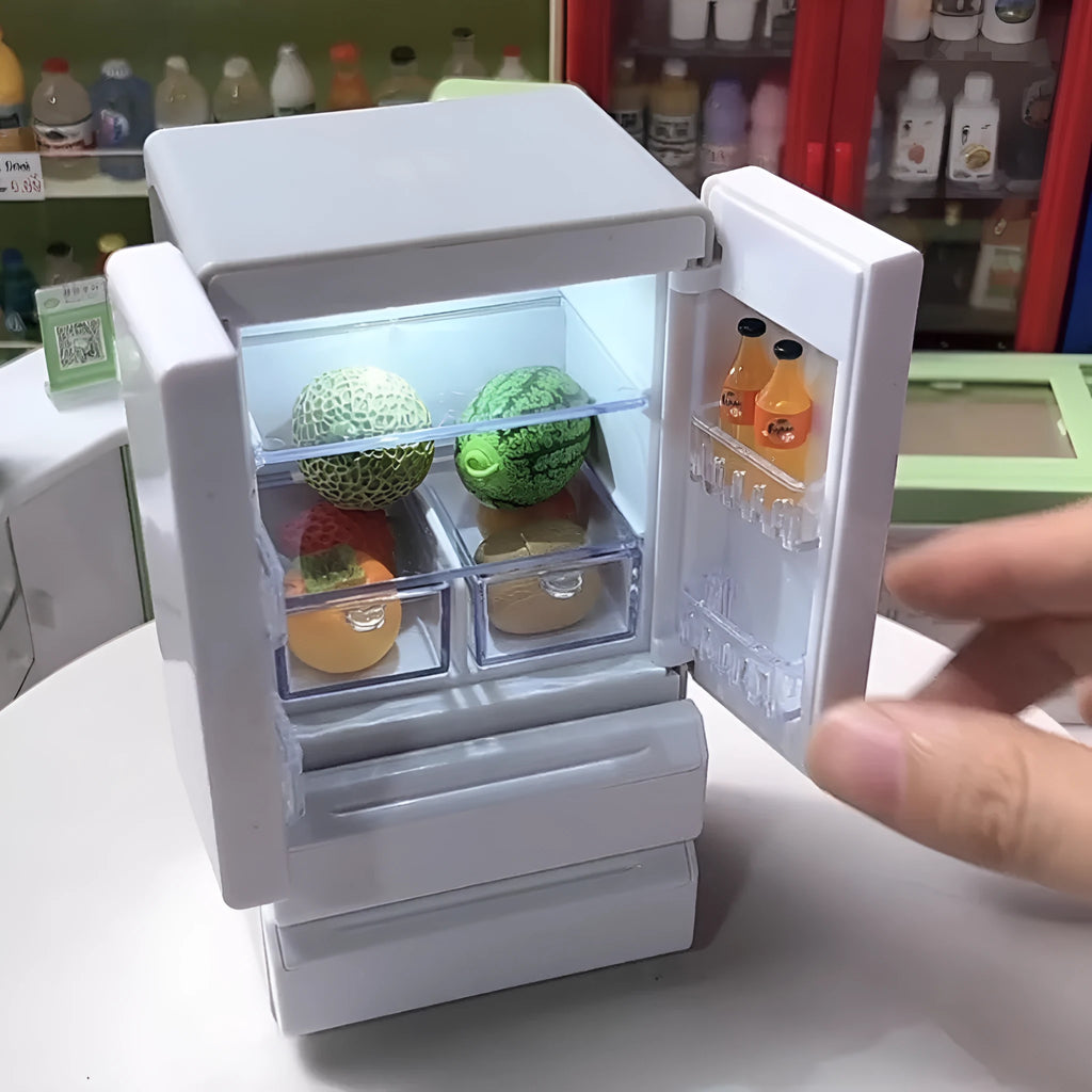 White plastic miniature candy toy model with activated LED lighting feature showing detailed surface texture