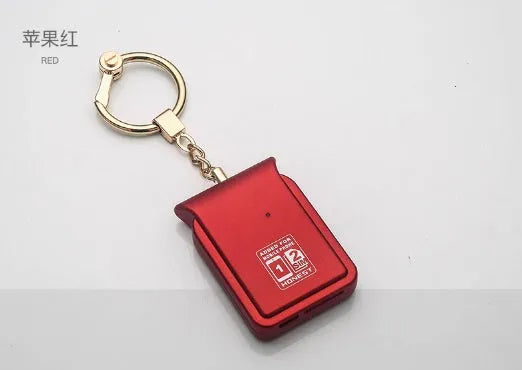 Bluetooth dual SIM adapter keychain for iOS with Nano SIM slot and Micro USB port.
