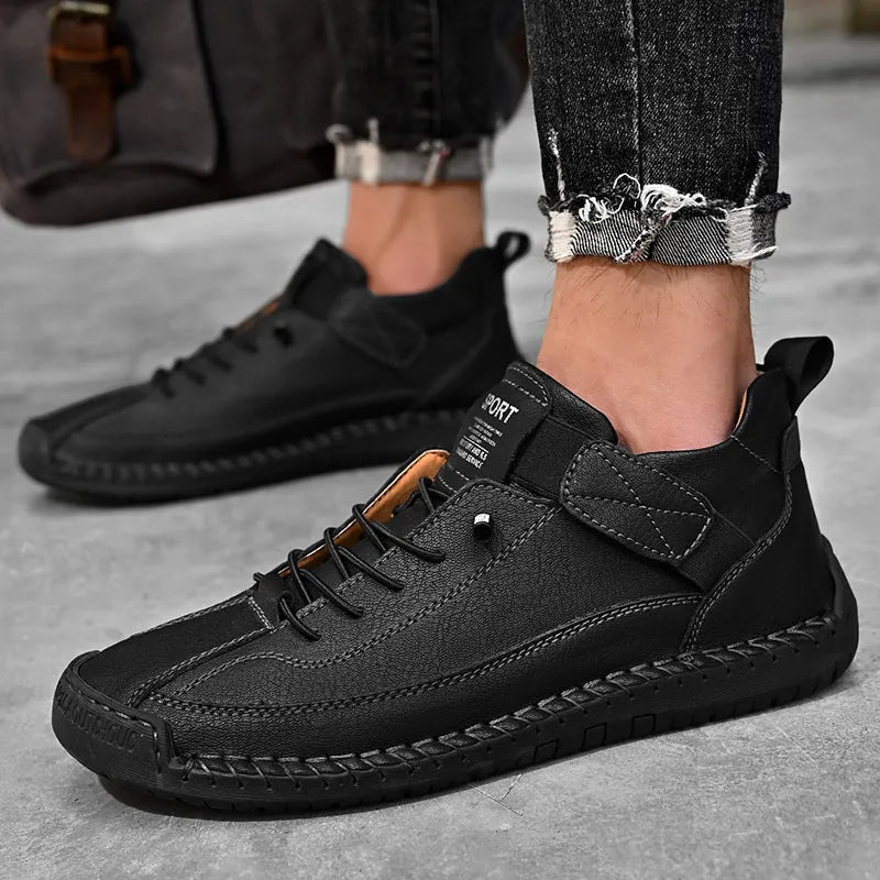 Men's mid-top Martin boots with microfiber upper, leather lining, and rubber sole in solid colour options for winter outdoor wear.