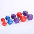 Bright colour plastic fitness dumbbells in random colours showing glossy surface finish for home exercise