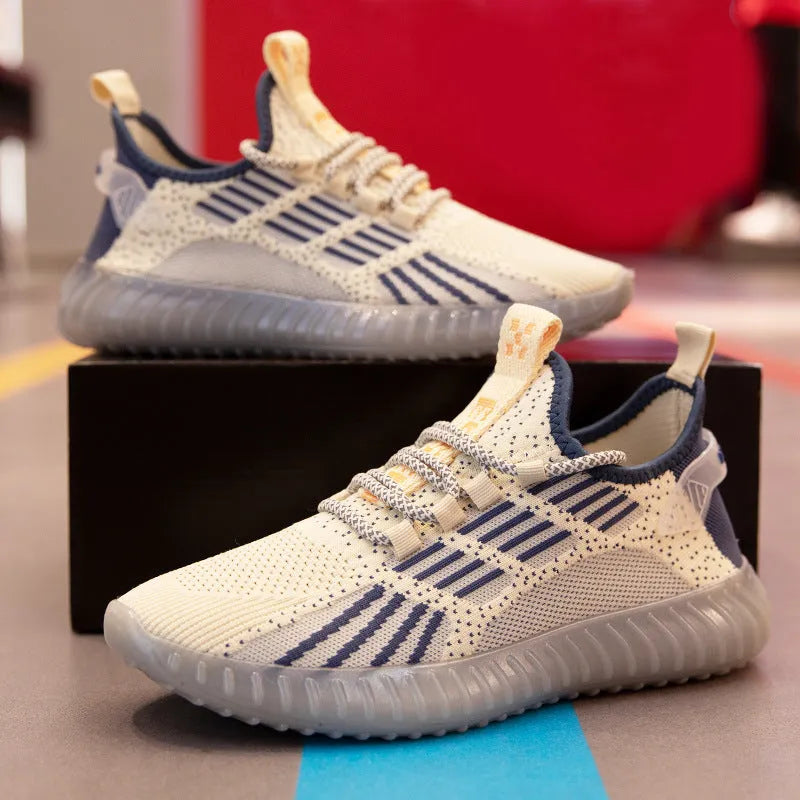 Men's white breathable flying fabric sports shoes with round toe and low-upper design.