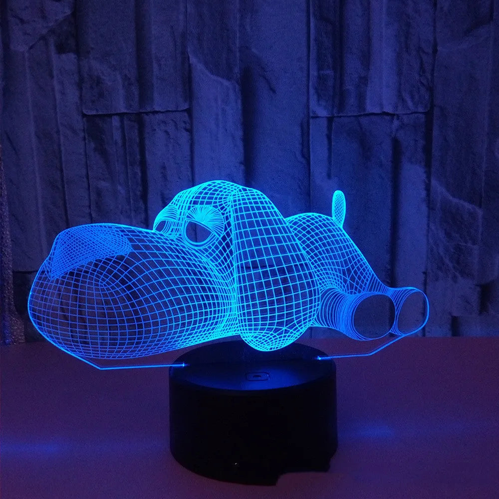Dog-shaped desktop lamp glowing in blue, with touch button and USB cable.