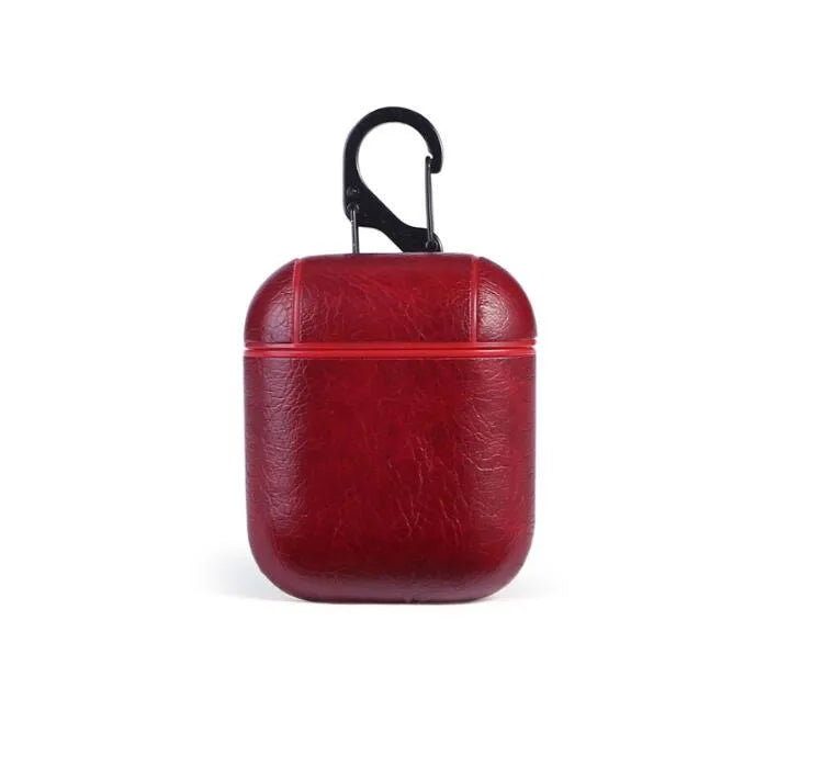 Genuine leather protective pouch for Apple Airpods charging case in black, brown, light brown, and red colours.