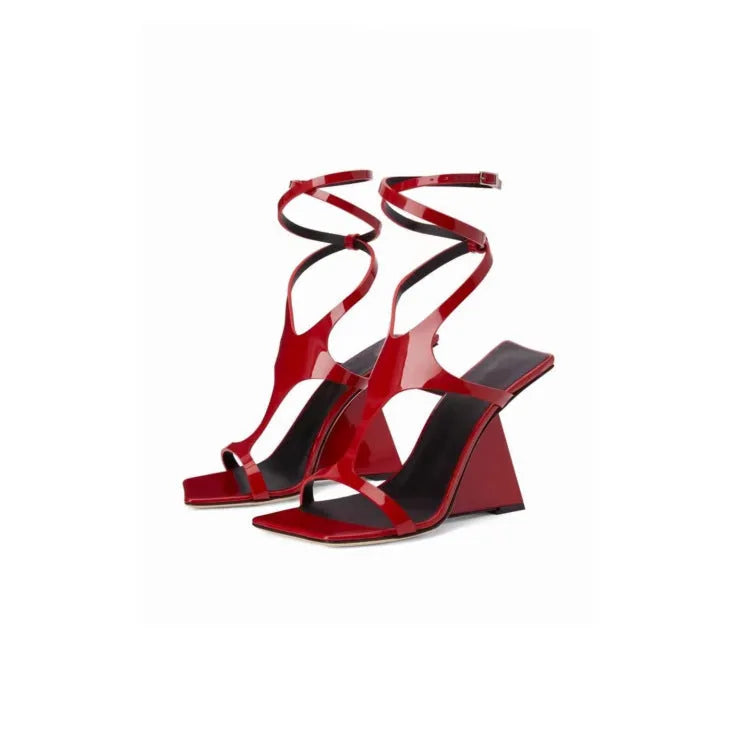 Women's black microfiber high heel sandals with a square toe and button fastening on a 9.5cm rubber heel.