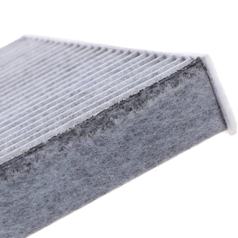 Grey Geely car air conditioning filter element measuring 215mm by 210mm by 30mm
