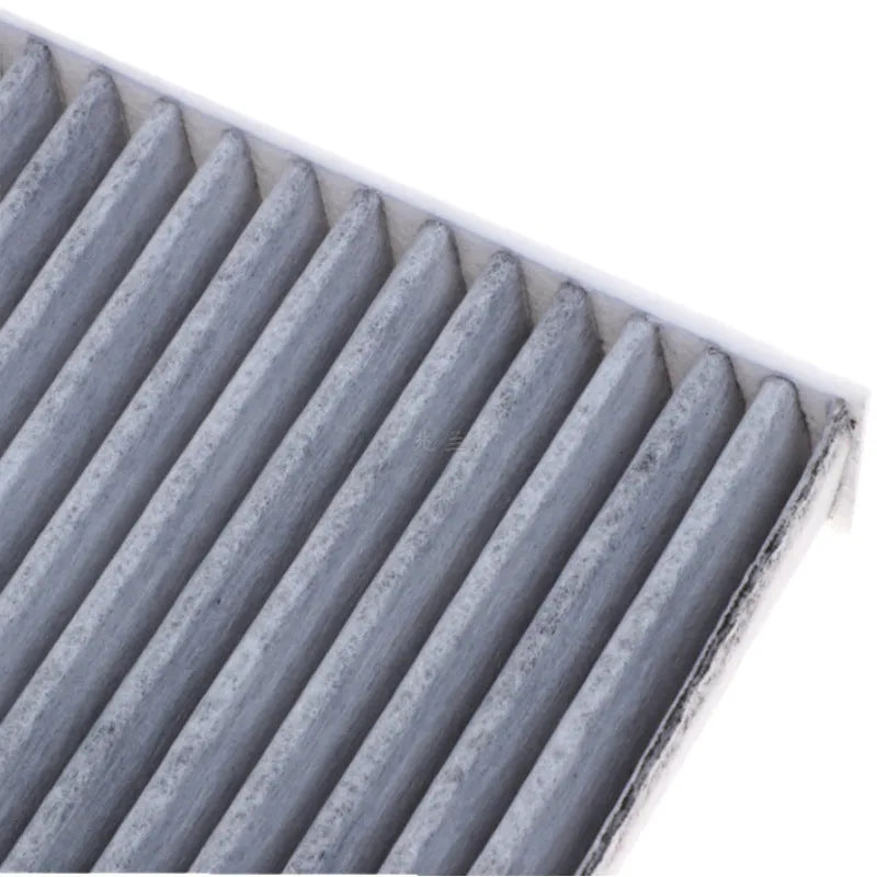Grey Geely car air conditioning filter element measuring 215mm by 210mm by 30mm