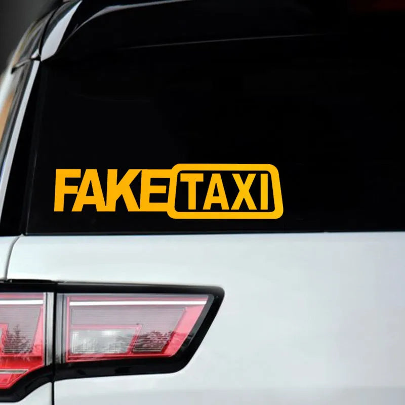 Waterproof black FAKE TAXI car sticker on a vehicle windshield, showing 20x8cm size.