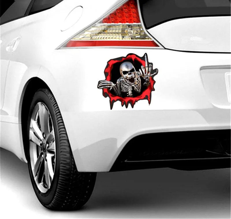 Reflective colourful broken shell peeping metal skull car sticker measuring 15x14cm