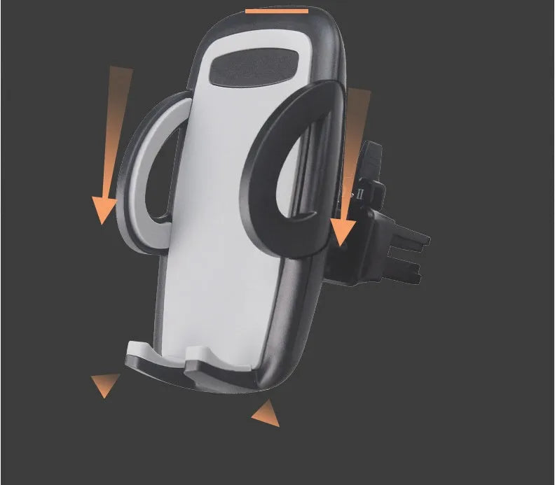 Black plastic mobile phone holder mounted on a car air conditioning vent