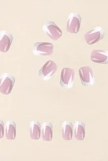 24 white plastic false nail tips with a black and white plaid pattern.