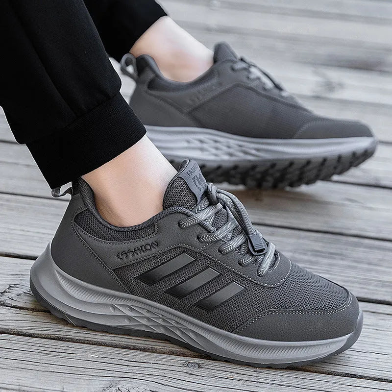 Casual breathable mesh slip-on shoes for men and women with elastic band and non-slip sole.