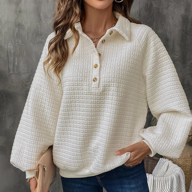 Women's milky white polo collar sweater with long sleeves and textured fabric.