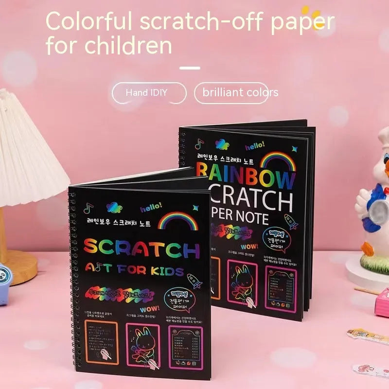 Large rectangular scratch art paper for children with a scraping tool on a colourful puzzle design background.