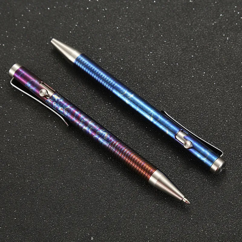 Titanium alloy ballpoint pen with gun bolt handle in a randomised phantom colour finish