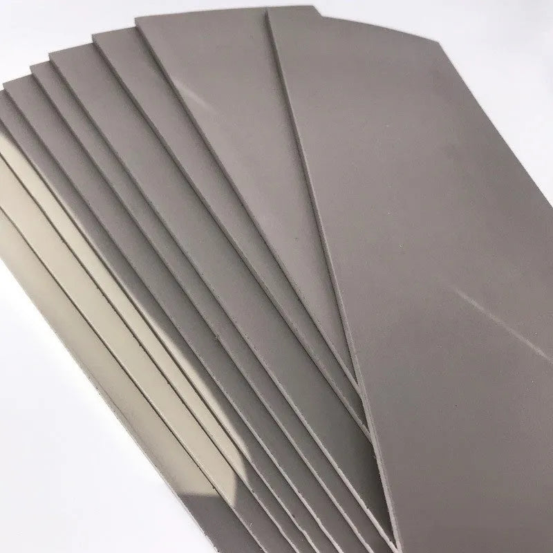 Black and grey plastic photosensitive mat for seal pottery, showing 330mm by 110mm sheet size.