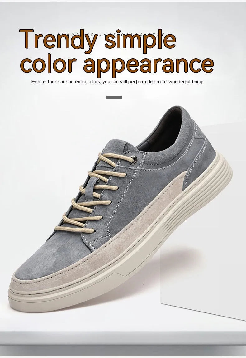 Men's grey casual skate shoes with pigskin upper and rubber sole, shown with front lace-up design and round toe