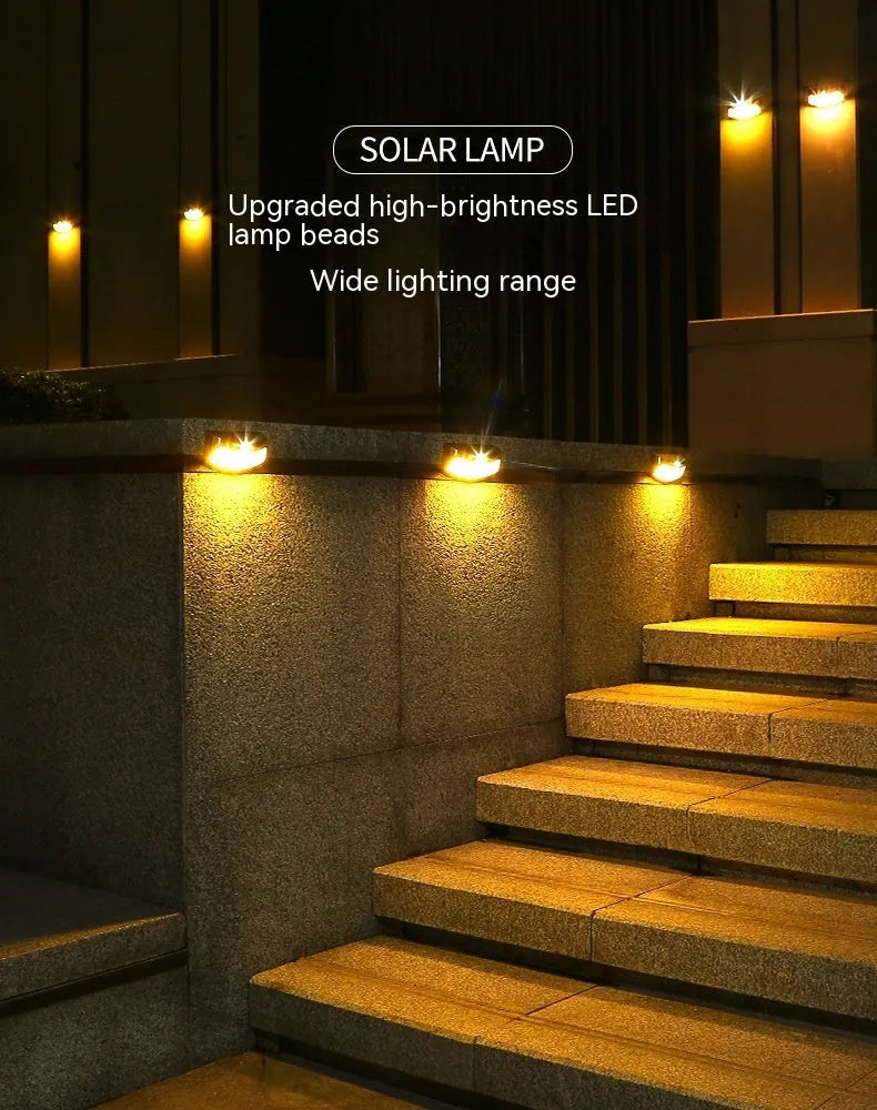 Solar outdoor wall lamp with smiling face design for garden decorative lighting