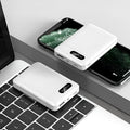 White or black portable power bank with 10000 mAh capacity measuring 92mm by 63mm