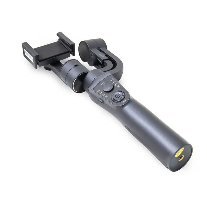 Black three-axis phone gimbal stabilizer with tripod accessory on table