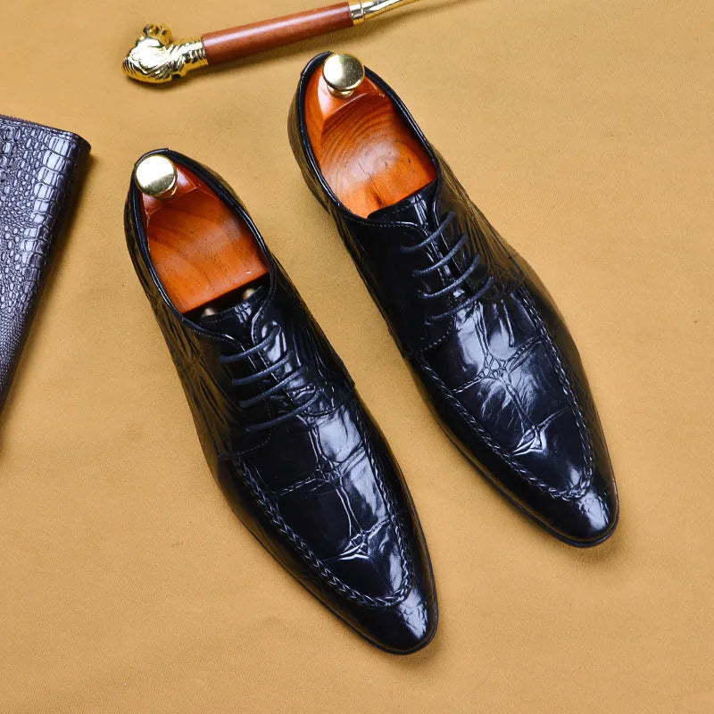 Men's black leather casual shoes with a silver horse bit buckle and a low rubber sole.