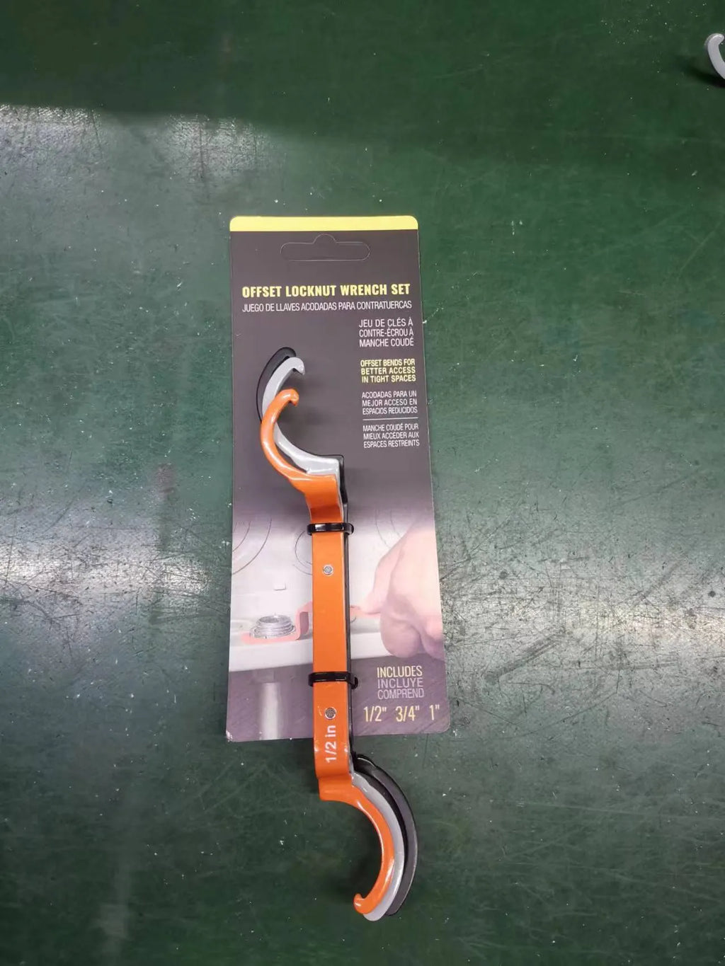 Three-piece wrench set showing orange, grey, and black wrenches with magnetic crescent and catheter locking types