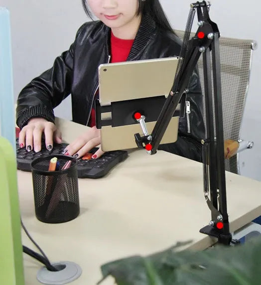 Adjustable black phone tablet stand on desktop holding mobile device at viewing angle