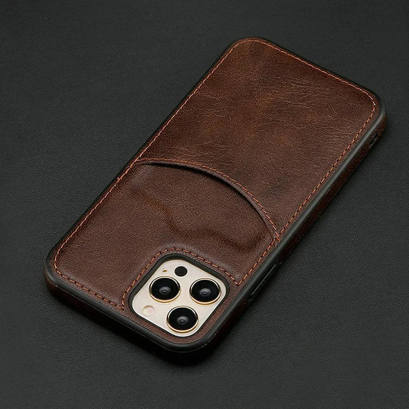 Dark blue PU leather protective case for various iPhone models on a table.