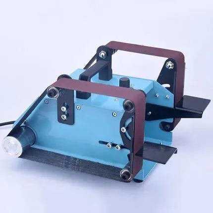 Blue desktop dual-axis belt sander with 750W power and 40 x 680 mm abrasive belt for workshop sharpening