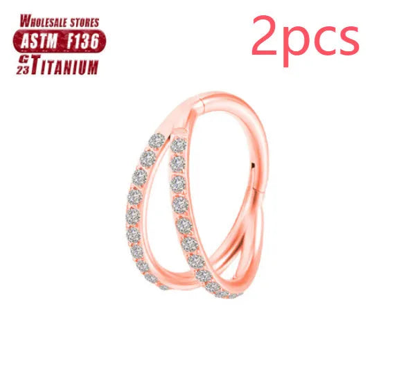 Titanium alloy fork nose ring in silver colour on a grey background
