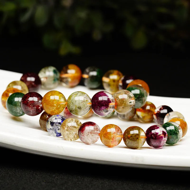 Natural colour crystal ghost cornucopia bracelet with 10mm beads and ethnic style design