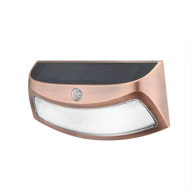 Solar outdoor wall lamp with smiling face design for garden decorative lighting