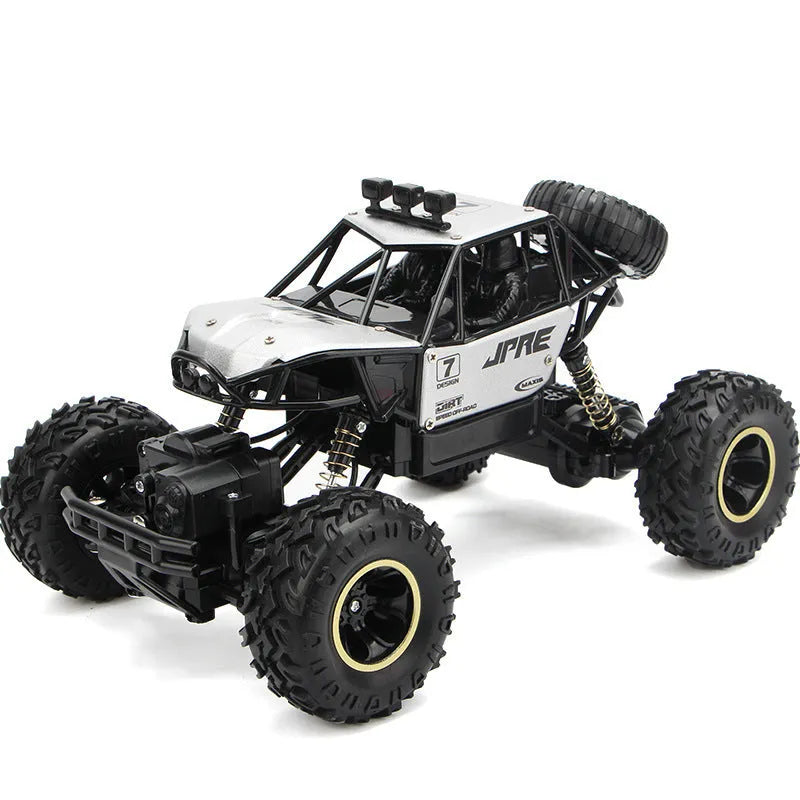 Black and silver 4WD remote control off-road climbing cars on rough terrain showing two size options.