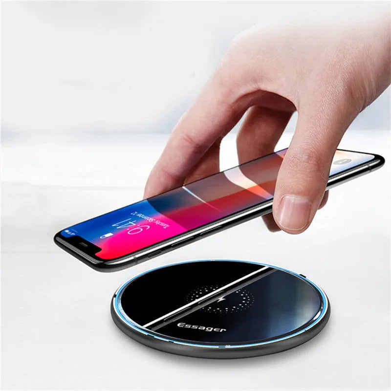 Black and white aluminium alloy wireless charging pad for phones with Qi fast charging and LED light.