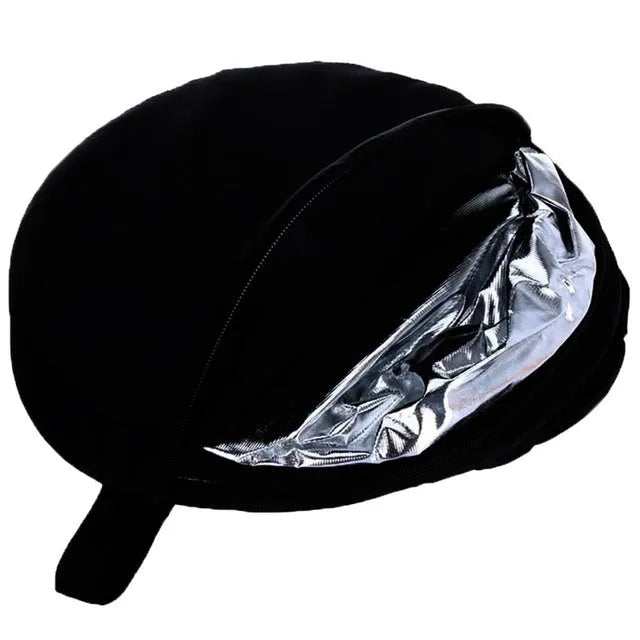 5-in-1 collapsible photography reflector showing gold, silver, white, black, and translucent surfaces folded beside carry bag