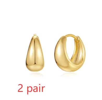 Brass diamond earclip earrings with geometric shape and gold electroplated finish