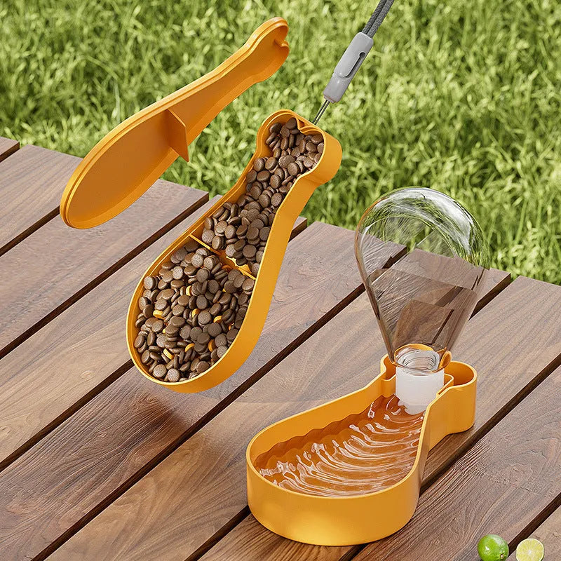 Orange and white portable pet water feeder showing water bottle and treat container compartments