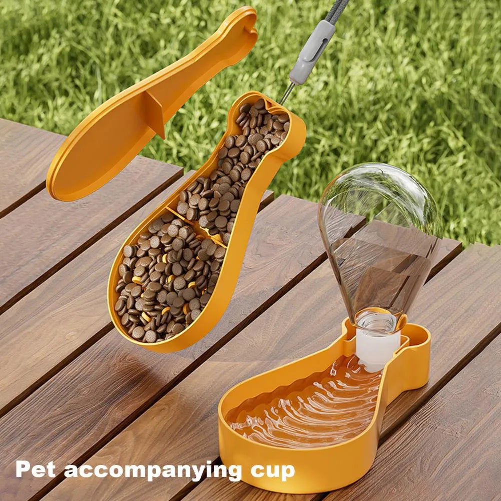 Orange and white portable pet water feeder showing water bottle and treat container compartments