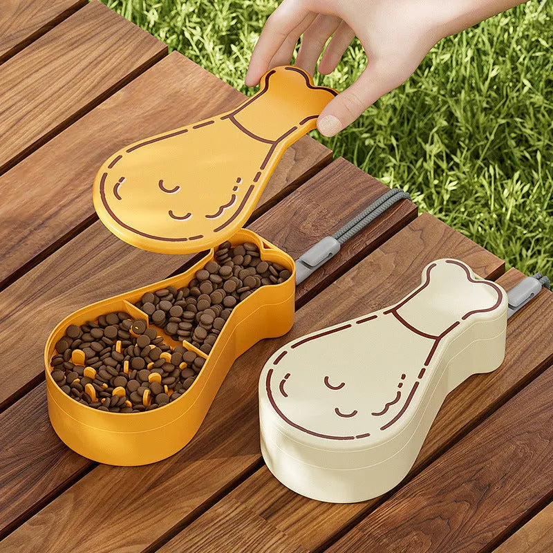 Orange and white portable pet water feeder showing water bottle and treat container compartments