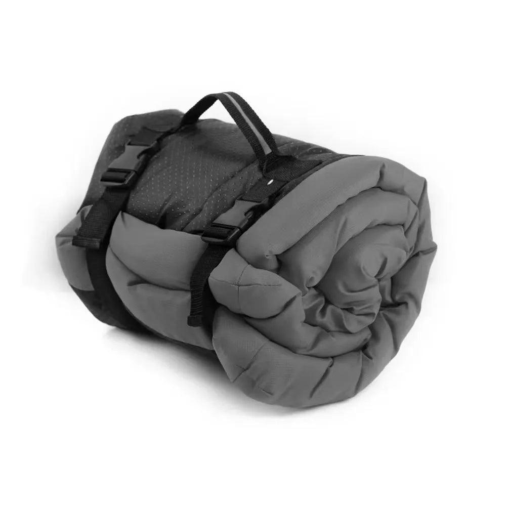 Blue foldable waterproof dog bed shown unfolded and folded, with nylon buckles and dotted anti-slip bottom.