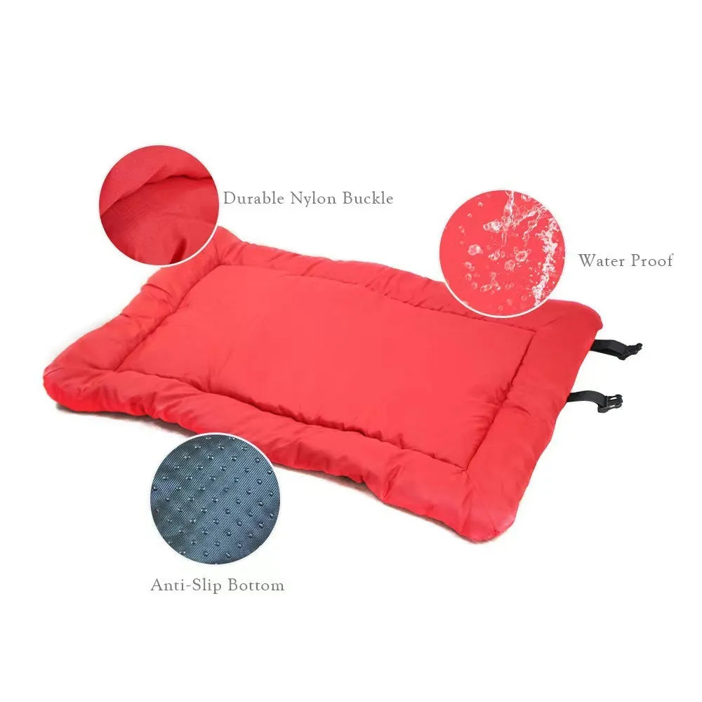 Blue foldable waterproof dog bed shown unfolded and folded, with nylon buckles and dotted anti-slip bottom.