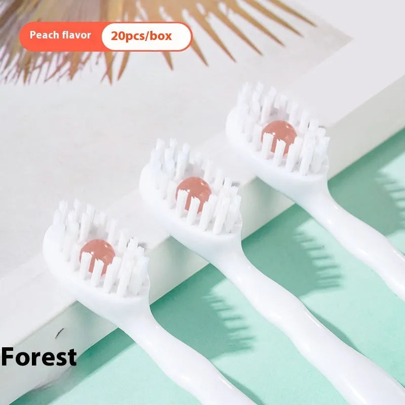Box of 20 disposable mint flavour bead toothbrushes for portable oral care.