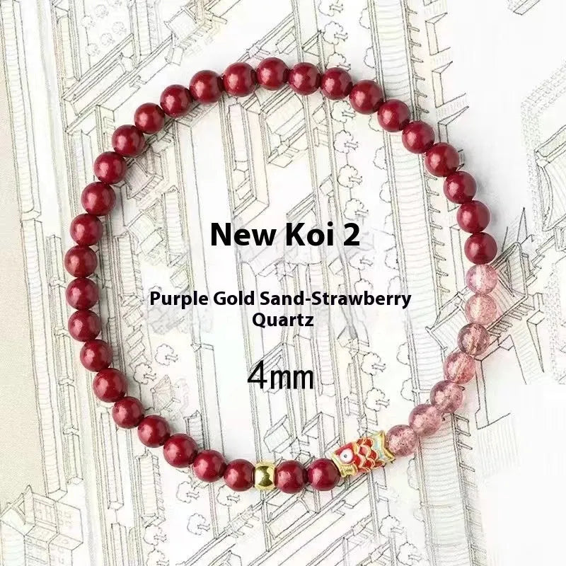Purple and pink cinnabar and strawberry quartz beaded bracelet with peach blossom and koi designs.