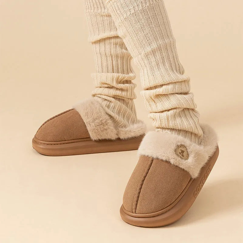 Plush fleece indoor slippers with thick PVC non-slip soles in multiple colours.