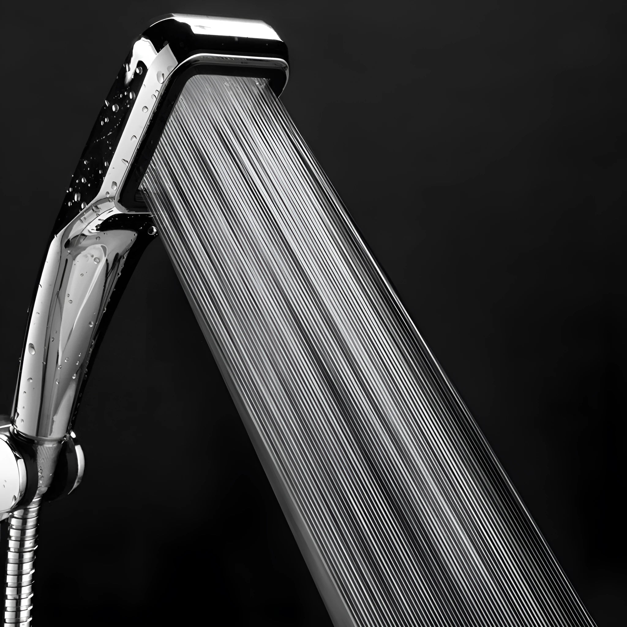 Hand-held pressurised rain shower head in orange and seven set configurations
