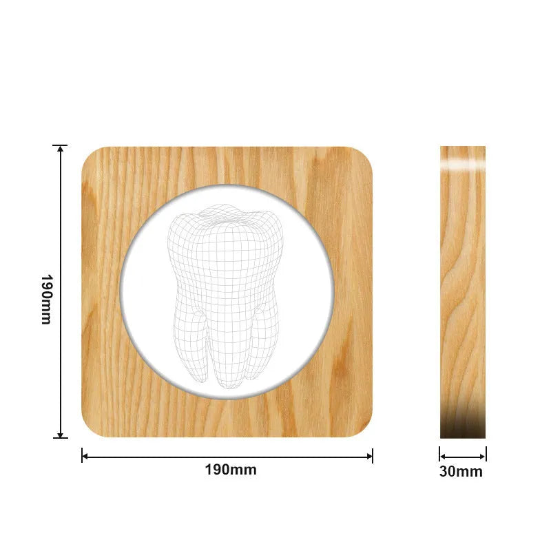 Tooth shaped wooden colour acrylic night lamp with USB cable on white background