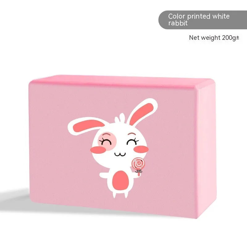 EVA foam yoga block in violet colour, shown next to a pink block, demonstrating its size and rectangular shape for fitness support.
