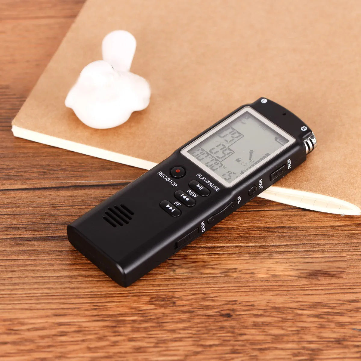 Black USB professional voice recorder unit with external microphone connector.