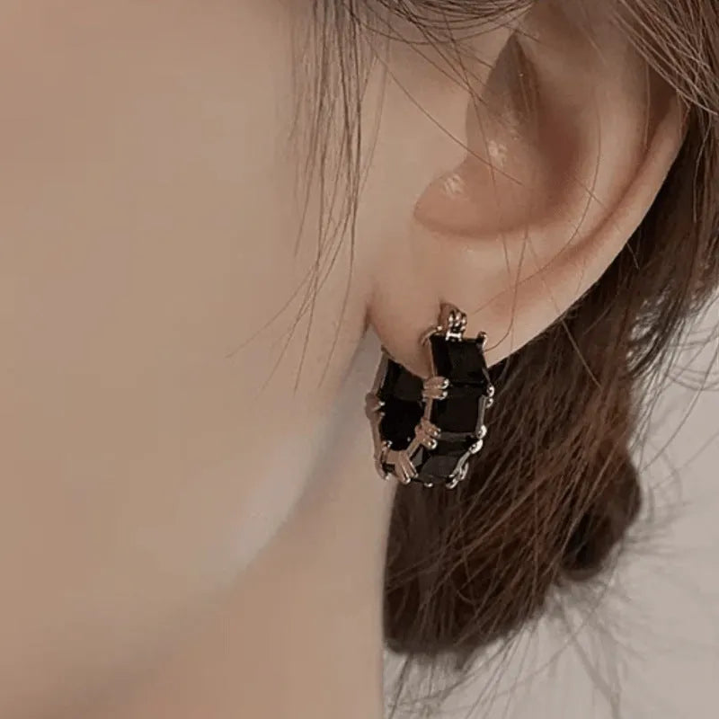 Geometric U-shaped zircon ear rings in gold setting with black, pink or white stone options