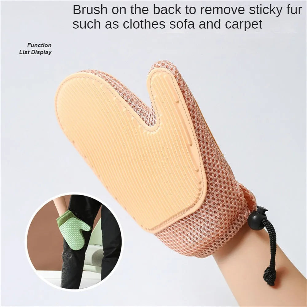 Dark blue pet grooming glove with silicone nubs for removing cat and dog hair.
