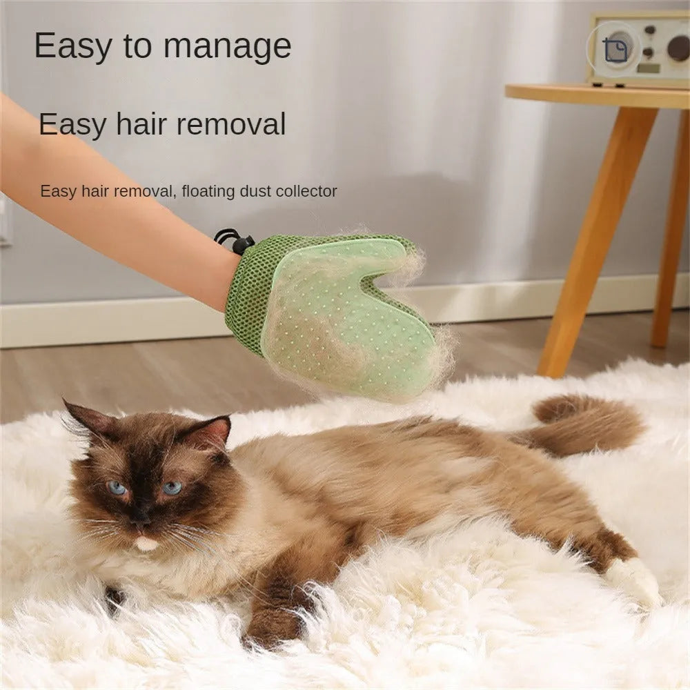Dark blue pet grooming glove with silicone nubs for removing cat and dog hair.